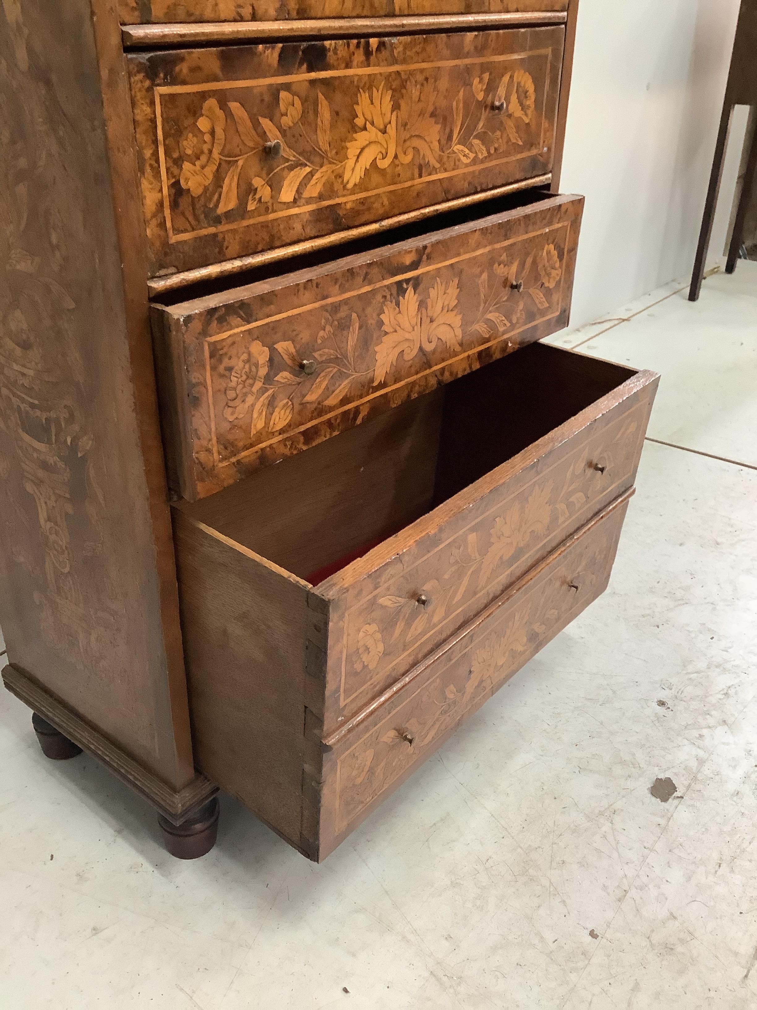 A small 19th century Dutch walnut and floral marquetry small chest of six drawers, width 52cm, depth 28cm, height 79cm